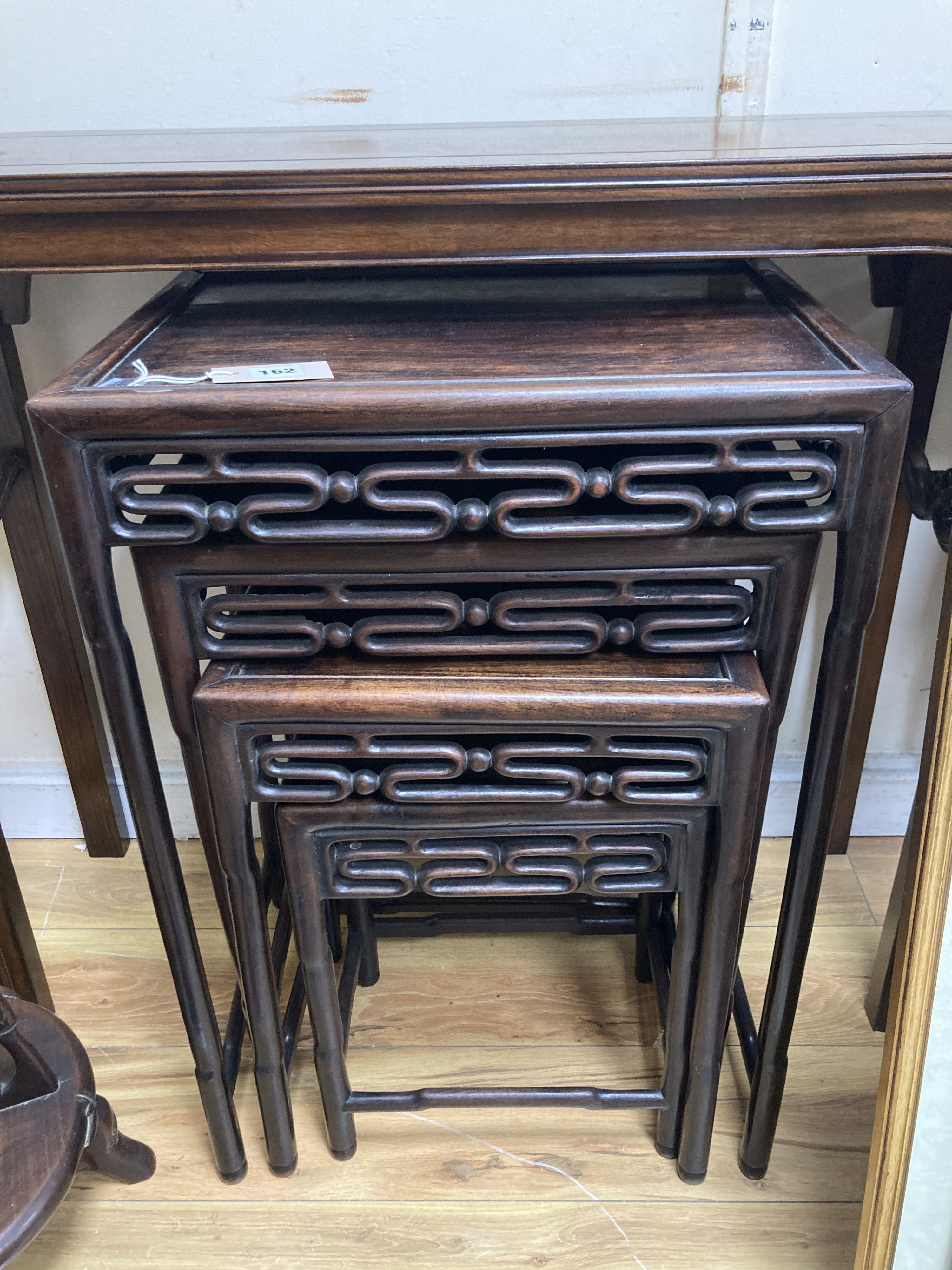 A quartetto of Chinese rectangular carved hardwood tables. W-50, D-36, H-72cm.